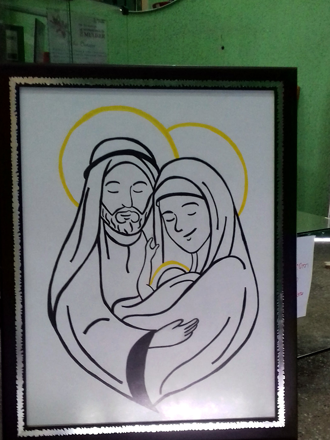 Quadro da Sagrada Família com moldura preta e filete prateado